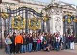 Group of young tourists outside the palace.