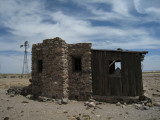 Macho (rattlesnake) Spring windmill and cabin