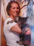 Picture of Chelle holding a Koala. Checkout those claws for climbing