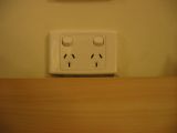 Heres what an electrical outlet looks like in Australia. Australia runs on 220 volts at 50 Hz so adapters are required