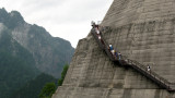 Stairway along a support wall