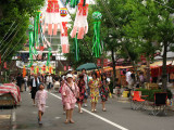 Festival-goers in traditional summer dress