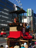 Spectators beside a dashi float