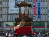 Dashi float amidst the crowd