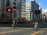 Carrying a banner down Ōtsu-dōri