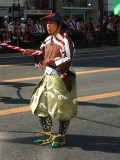 Attendant carrying the banner