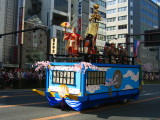 Toyotomi Hideyoshi atop a parade car