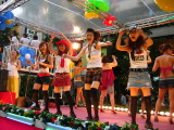 Stage girls atop the Mitsukoshi float