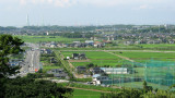 Rice fields and distant Chita industry