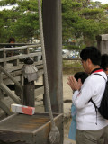 Offering a prayer at Godai-dō