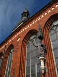 Courtyard view of the stained glass and spire