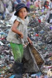 Children as young as infants can be seen at the landfill.