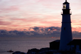 DSC00034.jpg LOBSTERIN THE DAWN at Portland Head LIght a fortuitous moment and light