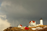132DSC03401.jpg MAGIC LIGHT IN A WILD VIOLENT SNOW SQUALL at nubble light lighthouse maine