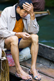 Exhausted Chinese Boatman