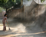 Woman Sweeping A Road (Dec 06)