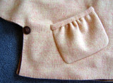 Side Button Closure and Pocket