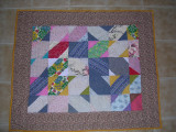 Linus Quilt 45x38 3-4-07.  1 of 11 made from donated patchwork curtains.  I added borders, batting and backs.