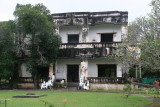 King Sihanouks villa in Kep now in ruins and with bullet holes in the walls