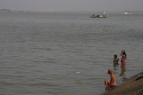 people bathing in Tonle Sap river