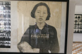 Photos of the victims of the Khmer Rouge line the walls