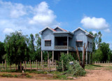Blue house on stilts
