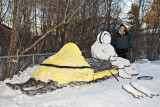 Jennifer Carpenter with snow sculpture she and Joe Nakogee built