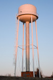 Back of former water tower at sunset