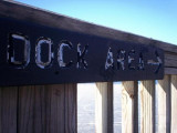 Dock sign, showing the way to Community Boating.