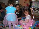 Nikky and girls playing with presents