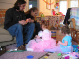 Uncle Sky , Nikky and girls playing with presents