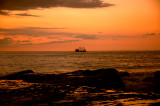 Fishing boat at sunset