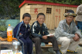 Tibetan kids collecting toilet charges