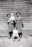 Aunt Helen holding Robin (Hornbeck) with Grandma and Mom
