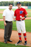 Chris Allen, COO of the South Coast League, presents Scott Robinson with the league MVP award.