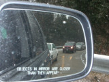 objects in mirror are closer than they appear