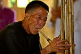 0547 Playing the lushen for the completion of the new drum tower. ***Explanation***