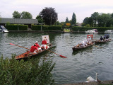 The boats close in on the Swans