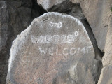 IMG_2964 defaced rock at cave entrance.jpg