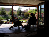 Sliding trifold doors open living to the outdoors.