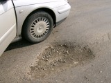 Typical pothole on road towards Kokshetau