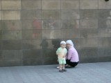 Outside main mosque, Almaty. Friday prayers