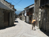 The main street in El Acebo deserted at midday