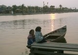 Children minding boat