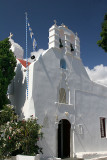 Mykonos Church with flag.jpg