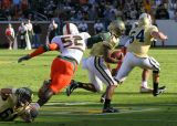 Tech QB Reggie Ball breaks a tackle