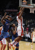Josh Smith goes strong to the basket