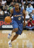 Gilbert Arenas brings the ball down court