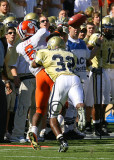 Clemson WR Jacoby Ford tries to reel in a sidelines pass with GT CB Jahi Word-Daniels in hot pursuit