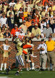 Clemson WR Aaron Kelly leaps to haul in a pass